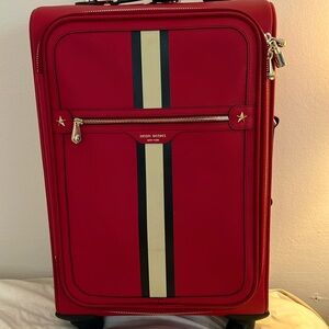 Henri Bendel carry-on wheelie. Red with gold hardware, black and cream stripe